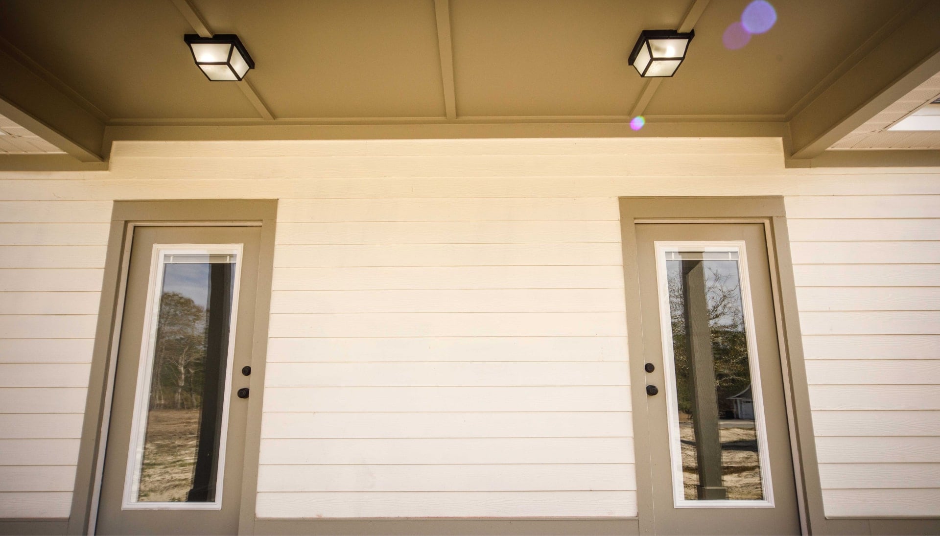 We offer siding services in Rock Hill, South Carolina. Hardie plank siding installation in a front entry way.